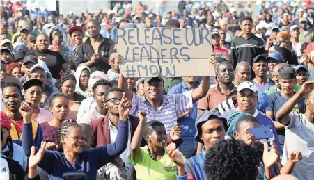  ?? PICTURE: PHANDO JIKELO/AFRICAN NEWS AGENCY/ANA ?? GRIEVANCES: Residents of Zwelihle township in Hermanus gather at the stadium where Minister of Police Bheki Cele hosted an imbizo on July 24, after violent protests that lasted for weeks.