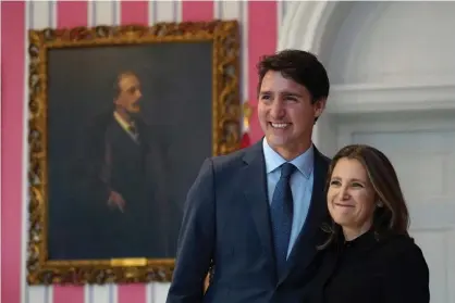  ??  ?? Chrystia Freeland with Justin Trudeau in Ottawa on Wednesday. Photograph: Chris Wattie/AFP via Getty Images