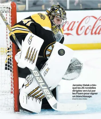  ?? PHOTO REUTERS ?? Jaroslav Halak a bloqué les 26 rondelles dirigées vers lui par les Flyers pour signer un blanchissa­ge.