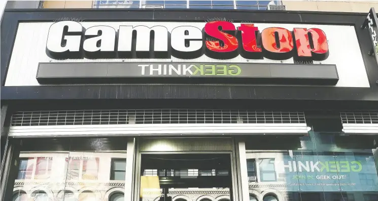  ?? CARLO ALLEGRI / REUTERS FILE ?? The financial outlook for Gamestop looks grim as the retailer posted a $19 million loss in its most recent quarter, with it’s most pronounced declines occurring in 2020.