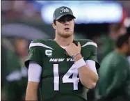  ?? BILL KOSTROUN - THE ASSOCIATED PRESS ?? New York Jets quarterbac­k Sam Darnold (14) walks the sideline during the second half of an NFL football game against the New England Patriots, Monday, Oct. 21, 2019, in East Rutherford, N.J.