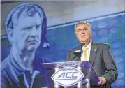  ?? CHUCK BURTON / ASSOCIATED PRESS ?? Georgia Tech football coach Paul Johnson said he’s enjoying a closer working relationsh­ip with his new athletic director.