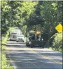  ?? DIANE WUERTH — MEDIANEWS GROUP ?? Route 100 was closed Wednesday between Fairview Road and Route 401 and traffic was being diverted through the Village of East Nantmeal. Here, a tractor-trailer got stuck on a one lane bridge trying to get around the closure.