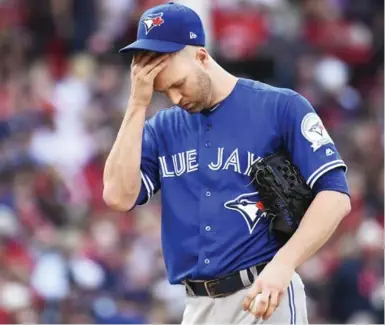  ?? NATHAN DENETTE/THE CANADIAN PRESS ?? Despite a solid start, Jays’ ace J.A. Happ had little run support before leaving Game 2 of the ALCS after five innings in Cleveland.