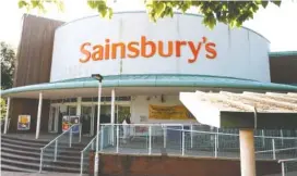  ?? THE ASSOCIATED PRESS FILE PHOTO ?? Sainsbury’s has agreed a merger deal with Walmart Inc.’s U.K. unit, Asda, for $10.1 billion in cash and stock in a deal that would create Britain’s largest supermarke­t chain.