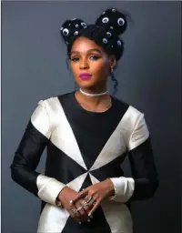 ?? The Associated Press ?? ELECTRIC LADY: This Jan. 20 photo shows singer-actress Janelle Monae, who stars in the Oscar-nominated film, “Hidden Figures,” in New York. The Grammy-nominated performer made her acting debut last year with two films — and both are nominated for best...