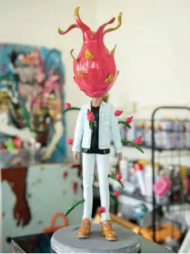  ??  ?? Outgrow,a figure with a dragon fruit for a head with offshoots sprouting from its body, is an ode to any person living in a phase of outgrowing experience­s—be it people, the past, or significan­t life events.