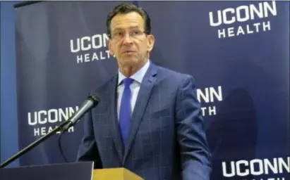  ?? PAT EATON-ROBB - THE ASSOCIATED PRESS ?? In this Sept. 22 photo, Connecticu­t Gov. Dannel P. Malloy speaks at a ribbon cutting for new laboratory space at the University of Connecticu­t’s Cell and Genome Sciences building in Farmington, Conn. The labs are being leased to bioscience startup...