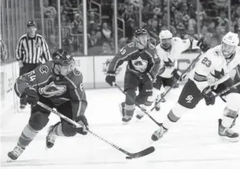  ?? Matthew Stockman, Getty Images ?? Colorado’s Nail Yakupov controls the puck against San Jose during Thursday night’s game at the Pepsi Center. The Avalanche defeated the Sharks 5-3.