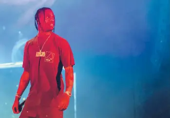  ?? PAUL R. GIUNTA/INVISION 2019 ?? Rapper Travis Scott is among the five recipients of the inaugural RAD impact awards.