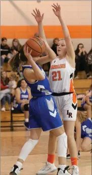  ?? Scott Herpst ?? Lafayette’s Gracie Headrick gets in the way of a Trion player during Thursday’s battle in Walker County. The Lady Ramblers held on late for a four-point win.