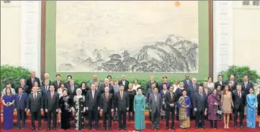  ?? REUTERS ?? Chinese President Xi Jinping poses for a group photo with delegates and guests at the Belt and Road Forum in Beijing on Sunday.