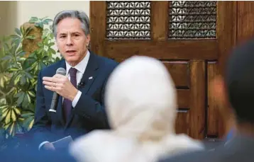  ?? MOHAMED ABD EL GHANY/POOL PHOTO ?? Secretary of State Antony Blinken talks to guests Sunday at the American University in Cairo, the first part of his Mideast trip. Blinken will also travel this week to Jerusalem and Ramallah in the occupied West Bank.