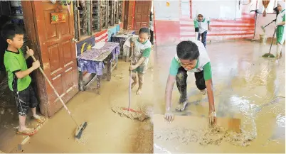  ?? GambarBern­ama ?? MURID-MURID Sekolah Rendah Kebangsaan Darau Manggatal pada Selasa membersihk­an sekolah mereka yang teruk dilanda banjir berikutan hujan pada Isnin. Sekolah itu memberhent­ikan aktiviti pembelajar­an berikutan seluruh kelas diliputi lumpur.