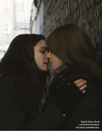  ??  ?? Rachel Weisz’s Ronit and Rachel McAdams’ Esti steal a forbidden kiss.