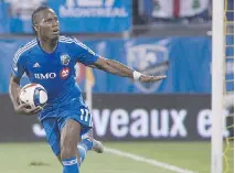  ?? GRAHAM HUGHES/THE CANADIAN PRESS ?? Didier Drogba and the Impact will face the Revolution, who can clinch a playoff spot if they beat Montreal.