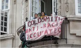  ?? Photograph: Anna Gordon/The Guardian ?? ‘The real point about race cards is that claiming their existence is itself deeply racist.’ Goldsmiths, University of London students stage an anti-racism protest at Deptford Town Hall in March.