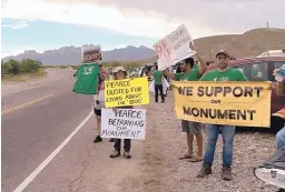  ?? DAN MCKAY/JOURNAL ?? Gabe Vasquez, right, was among a group of protesters in Las Cruces during a visit by Interior Secretary Ryan Zinke, who is considerin­g whether to recommend shrinking the size of Organ Mountains-Desert Peaks National Monument and other monuments.