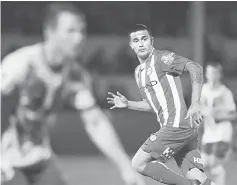  ??  ?? Melbourne City’s Tim Cahill runs during the Football Federation Australia match against Brisbane Strikers at Perry Park in Brisbane. — AFP photo