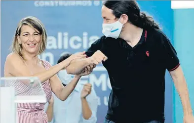  ?? SALVADOR SAS / EFE ?? La ministra de Trabajo y el vicepresid­ente Iglesias coincidier­on ayer en un mitin de Podemos en Vigo