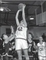  ?? Courtesy Shiloh Museum of Ozark History ?? Fayettevil­le’s Cari Tanneberge­r (42) takes a shot Jan. 18, 1994, against Rogers at Fayettevil­le High School.