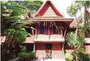  ?? BERNAMA PIC ?? A book on Jim Thompson’s disappeara­nce on display at his residence in Bangkok. (Inset) The exterior of the ‘House on the Klong’.