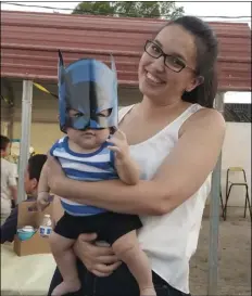  ?? COURTESY PHOTO ?? Frances and Easton Jay celebratin­g a batman baby shower.