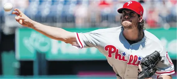  ?? ANDREW HARNIK/THE ASSOCIATED PRESS ?? Philadelph­ia Phillies starting pitcher Aaron Nola has come out of obscurity to become a viable Cy Young candidate as the top pitcher in the NL this season.