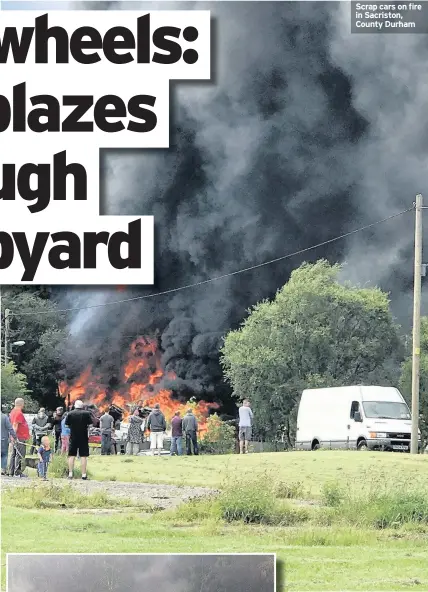  ??  ?? Scrap cars on fire in Sacriston, County Durham