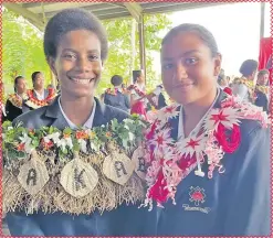  ?? Picture: ANA MADIGIBULI ?? Adi Cakobau School day-scholar Year 12 deputy head girl Anaseini Nakabea and boarder Year 12 deputy head girl, Sophia Rafai after their induction last week at the school.