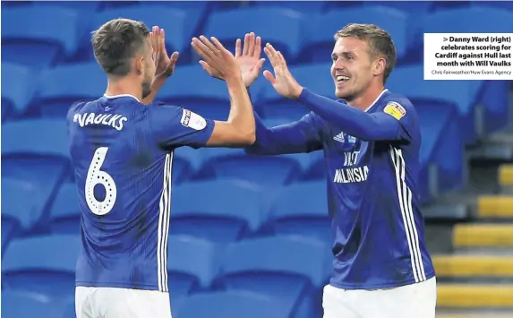  ?? Chris Fairweathe­r/Huw Evans Agency ?? > Danny Ward (right) celebrates scoring for Cardiff against Hull last month with Will Vaulks