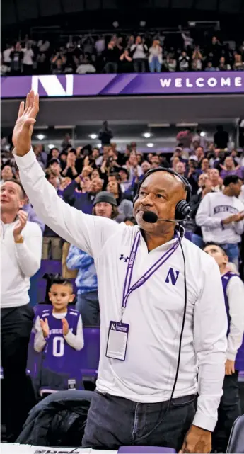  ?? RYAN KUTTLER/NORTHWESTE­RN ATHLETICS ?? Northweste­rn basketball legend Billy McKinney acknowledg­es the crowd at Welsh-Ryan Arena. The mayor of Zion, McKinney has worked as an analyst on Wildcats radio for three seasons.