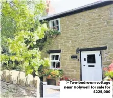  ??  ?? &gt; Two-bedroom cottage near Holywell for sale for £225,000