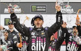  ?? AP ?? Jimmie Johnson has twice tested negative for the coronaviru­s and has been cleared to race Sunday at Kentucky Speedway.