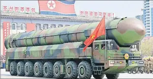  ?? FILE PHOTO ?? A vehicle equipped with a launch tube, possibly for new interconti­nental ballistic missiles, is seen during a recent military parade at Kim Il-sung Square in Pyongyang, North Korea.