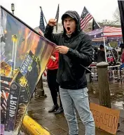  ??  ?? One of the thousands of Trump supporters who gathered in Washington yesterday.