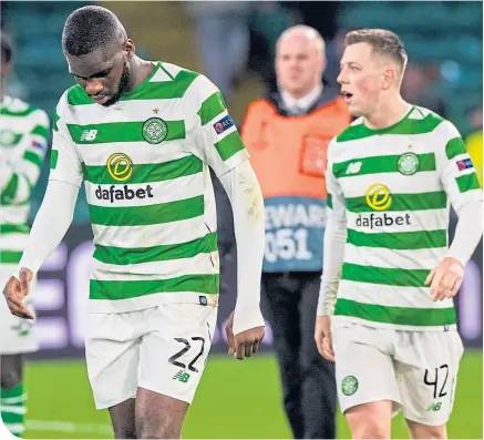  ??  ?? Odsonne Edouard and Callum Mcgregor dejectedly troop off the field after the 2-0 defeat by Valencia