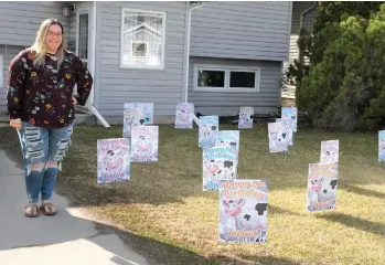  ??  ?? It was a moo-ving 19th birthday celebratio­n for Jayleen Mantell, as her family installed 19 cow-themed signs on the front lawn to help celebrate the special occasion. Mantell is a 4-H member. Photo by Jason G. Antonio