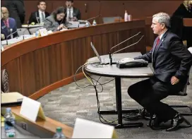  ?? BOB ANDRES / BANDRES@AJC.COM ?? State Sen. Marty Harbin sits before the committee before the hearing’s postponeme­nt. His proposal to strengthen legal protection­s for religious Georgians stalled as the Senate Judiciary Committee ran out of time to discuss it.