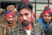  ?? HT PHOTO ?? Gangster Davinder Singh, alias Babli Randhawa, in police custody after surrenderi­ng before court in Sangrur on Tuesday.