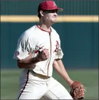  ?? NWA Democrat-Gazette/J.T. WAMPLER ?? Arkansas’ Evan Lee pumps his fist as the Razorbacks finish off Alabama 9-7 on Sunday at Baum Stadium in Fayettevil­le. Seven of eight Arkansas pitchers combined to issue a school-record 15 walks in a game that lasted 4 hours and 27 minutes.