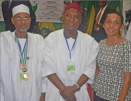  ??  ?? L-R: National President, Nigerian Institute of Food Science and Technology (NIFST), Dr. Dahiru J. Adamu; Deputy Governor, Kano State, Prof. Hafiz Abubakar; and Vice President, Scientific and Regulatory Affairs, The Coca-Cola Company, Dr. Wamwari...