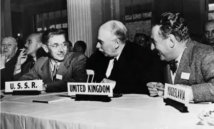  ??  ?? John Maynard Keynes (centre) played a leading role in the formulatio­n of the Bretton Woods agreements and instrument­al in the establishm­ent of the IMF. Photograph: Hulton Archive/Getty Images