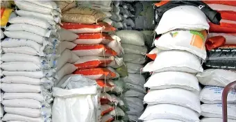  ??  ?? Stocks of rice in Pettah: The government’s maximum retail price of Rs. 98 for nadu and samba is not reflected in average market prices, which are considerab­ly higher