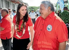  ?? JASON OXENHAM ?? Samoan Prime Minister Tuilaepa Malielegao­i and Jacinda Ardern chat before the Pacific leaders gather for a formal photo opportunit­y.