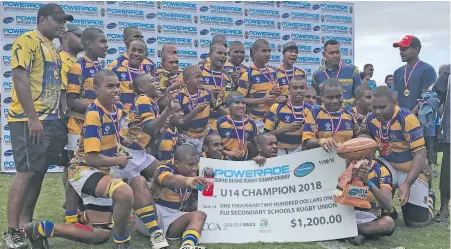  ?? Photo: Rosi Dovivereta ?? Ratu Kadavulevu School Under-14 players and officials after the official presentati­on at the ANZ Stadium, Suva on August 11, 2018.