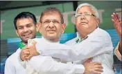  ?? PTI FILE ?? RJD chief Lalu Prasad with rebel JD(U) leader Sharad Yadav during the 'BJP bhagao, desh bachao' rally in Patna in August.