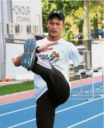  ??  ?? In high
spirits: Ashraf training in Bukit Jalil in preparatio­n for Asean Para Games.