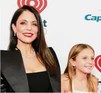  ?? Jason Mendez/Getty Images ?? Bethenny Frankel, left, and her daughter Bryn Hoppy attend Z100's iHeartRadi­o Jingle Ball 2021 at Madison Square Garden on December 10, 2021 in New York City. Frankel recently stopped into Elm Street Diner in Stamford.