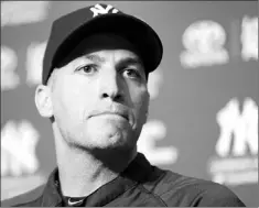  ?? — Photo by The Associated Press ?? New York Yankees pitcher Andy Pettitte pauses as he talks to reporters regarding his decision to retire at the end of the season, before the Yankees’ game against the San Francisco Giants on Friday at Yankee Stadium in New York.